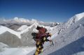 cho_oyu_sherpa_carrying_load.JPG